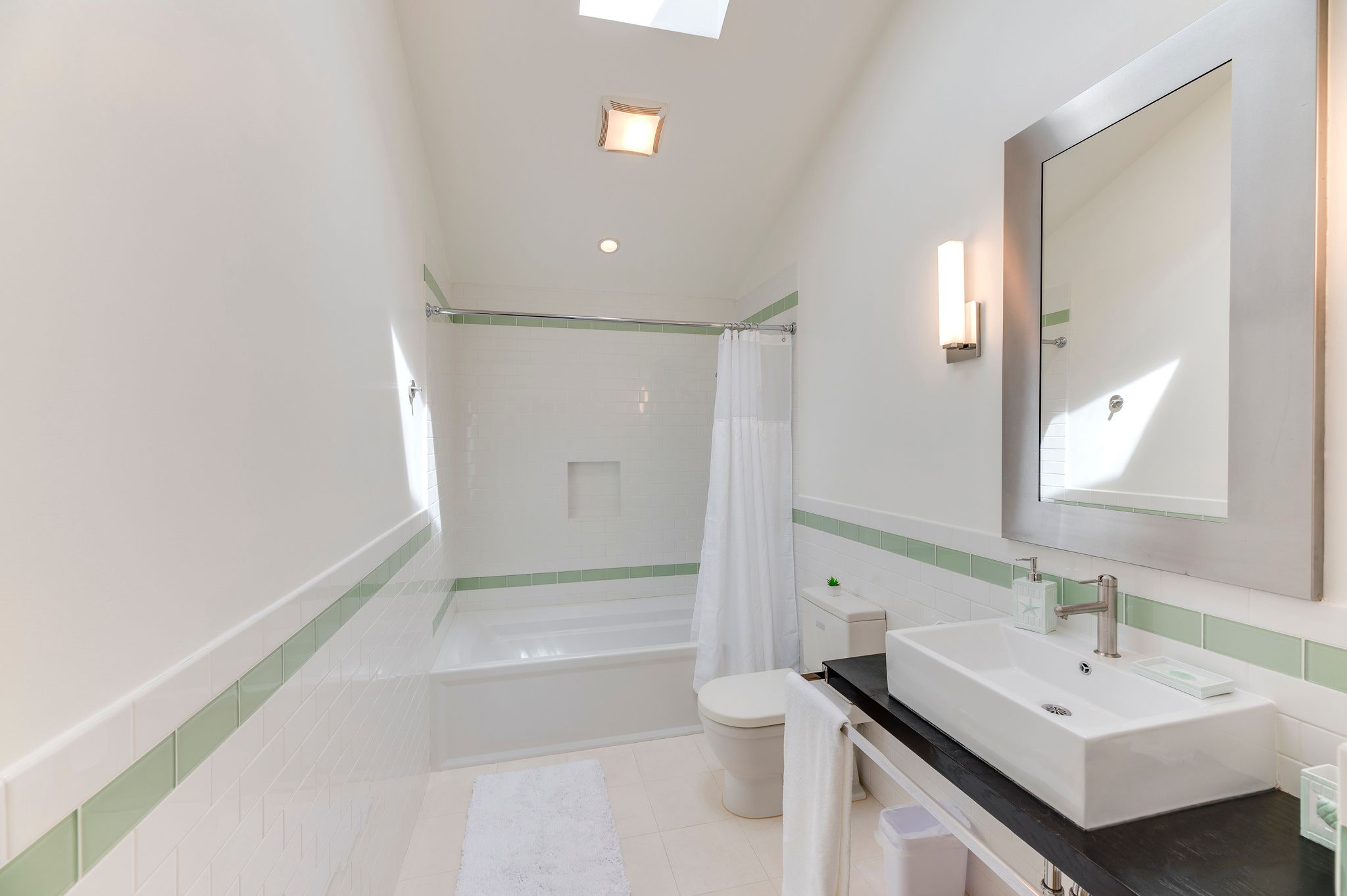 249 Roses Grove Road Water Mill, NY 11976 - Photo 18 of 21 a bathroom with a sink a toilet and shower