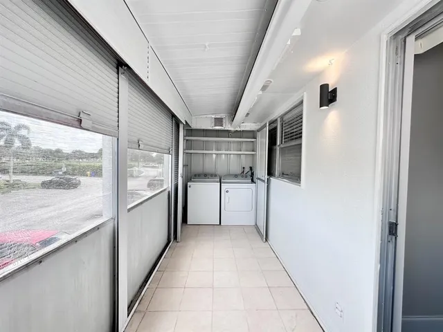 a view of a room with racks on the wall