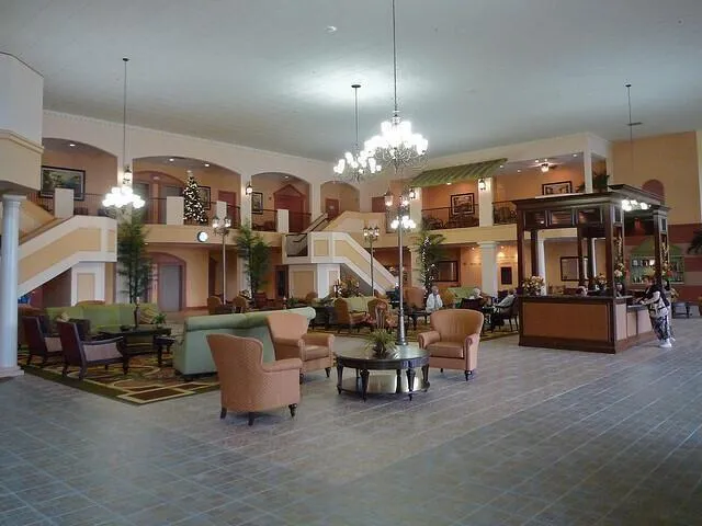 an aerial view of multiple houses with a yard