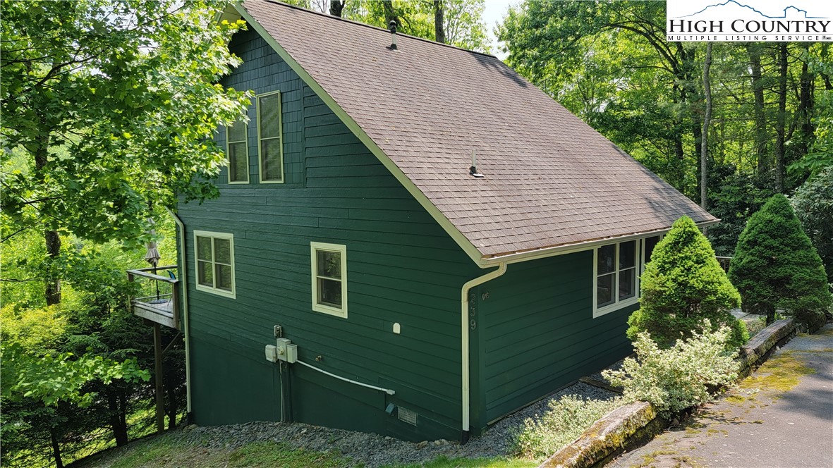 239 Wyndham Way Boone, NC 28607 - Photo 1 of 32 a view of a backyard