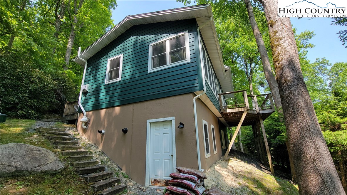 239 Wyndham Way Boone, NC 28607 - Photo 29 of 32 a view of a house with a yard