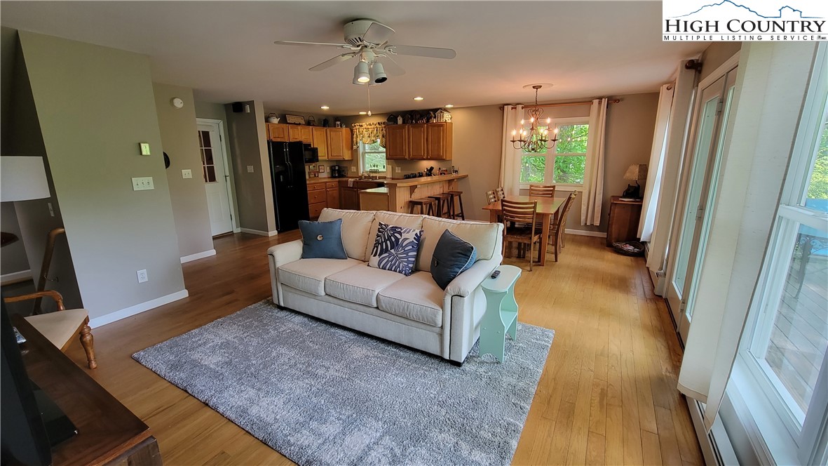 239 Wyndham Way Boone, NC 28607 - Photo 4 of 32 a living room with furniture and a fireplace