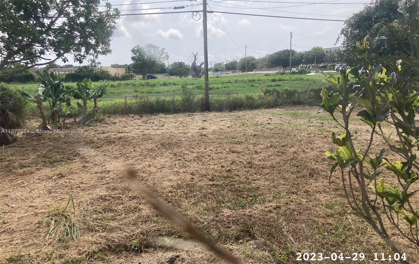 106 Engle Road Lake Worth, FL 33461 - Photo 10 of 10 a view of a field with a tree