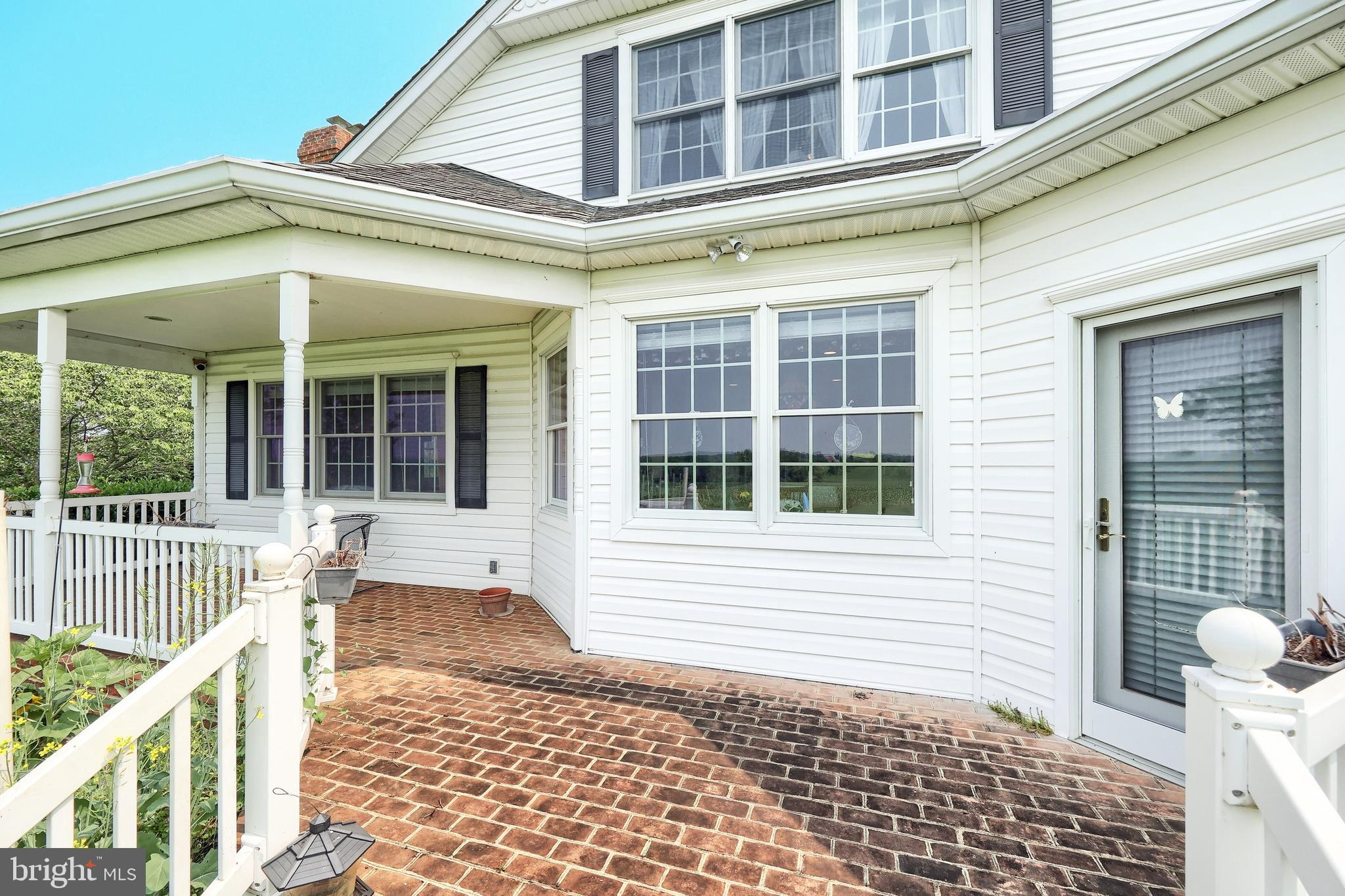 2700 Stockton Road Phoenix, MD 21131 - Photo 17 of 84 a front view of a house with large windows