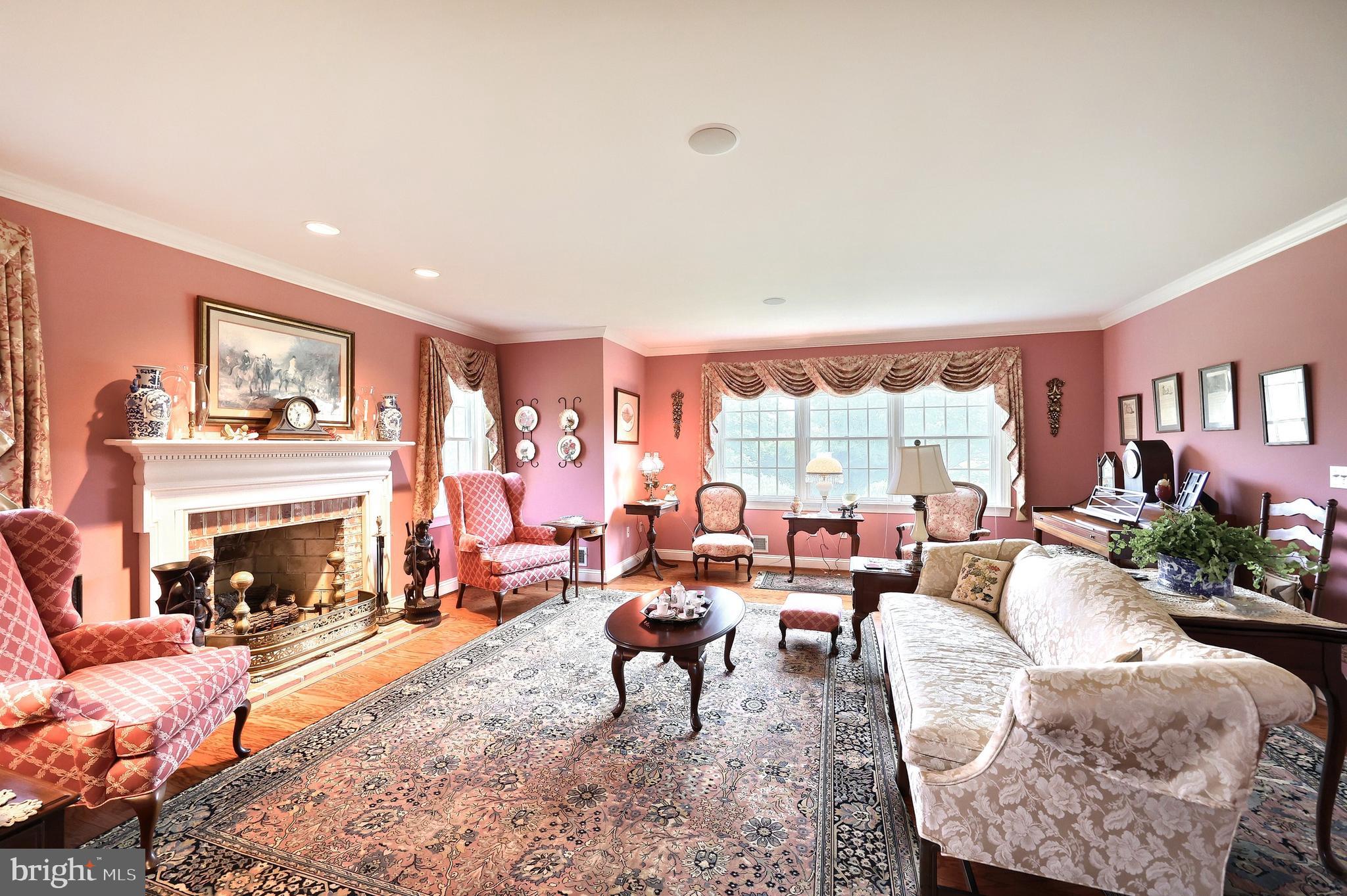 2700 Stockton Road Phoenix, MD 21131 - Photo 24 of 84 a living room with furniture large window and a fireplace
