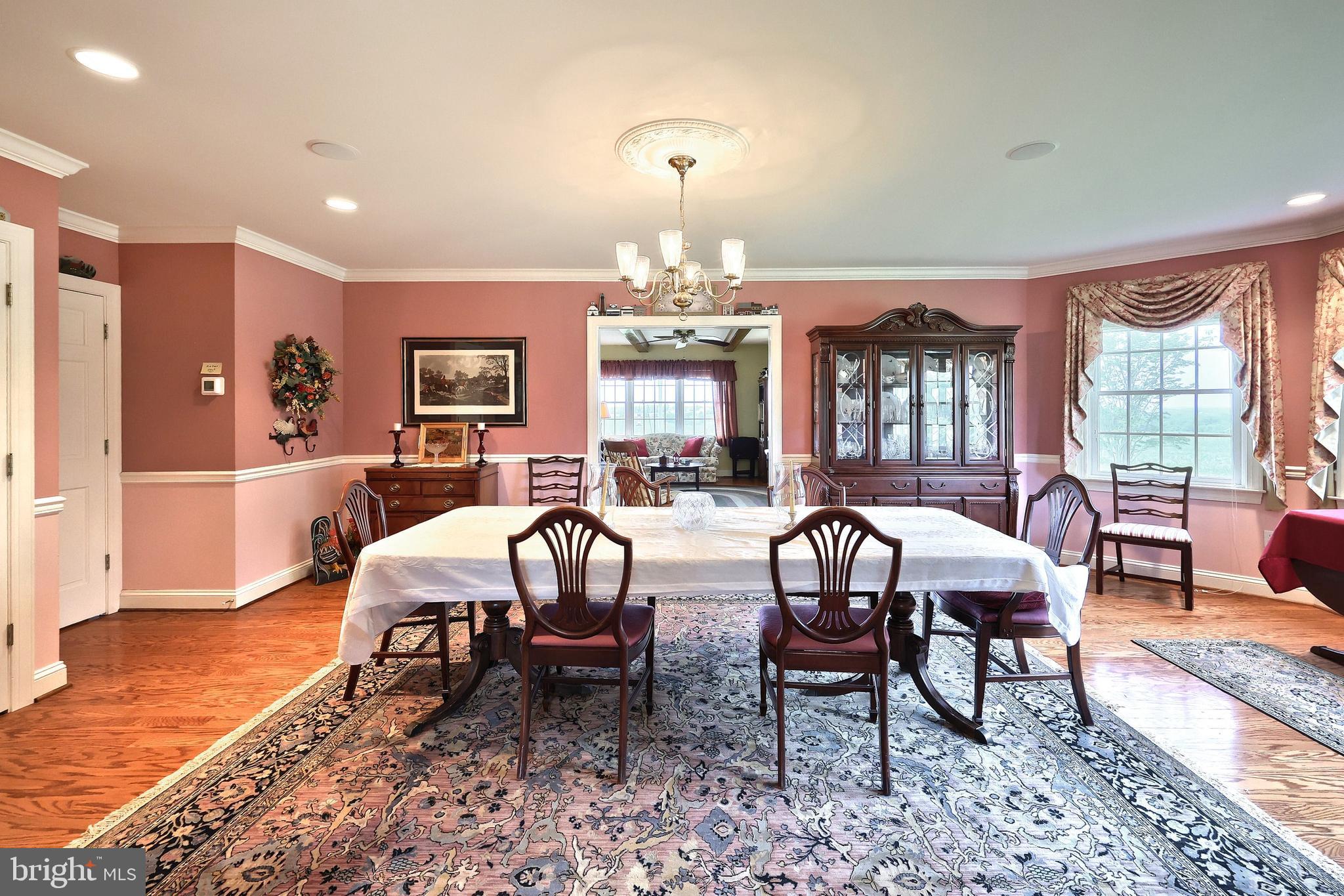 2700 Stockton Road Phoenix, MD 21131 - Photo 26 of 84 a view of a dining room with furniture window and wooden floor