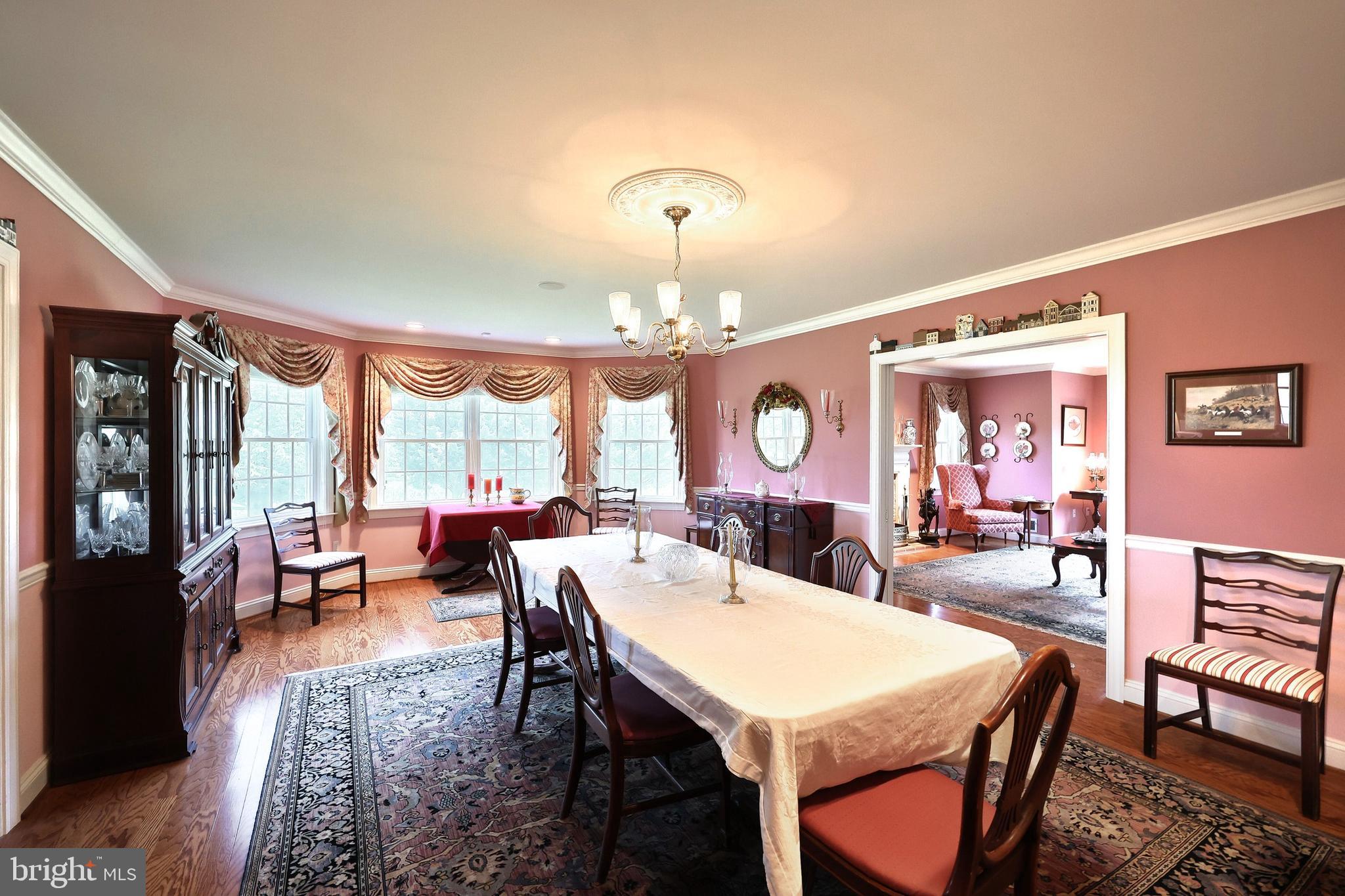2700 Stockton Road Phoenix, MD 21131 - Photo 27 of 84 a view of a dining room with furniture window and wooden floor