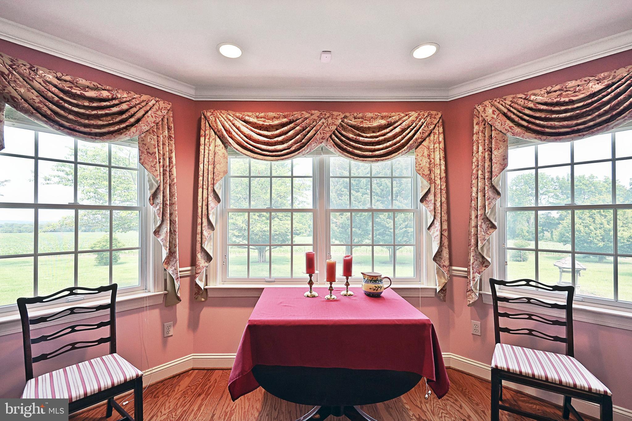 2700 Stockton Road Phoenix, MD 21131 - Photo 28 of 84 a spacious bedroom with a bed and a large window