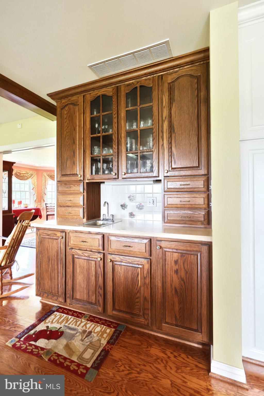 2700 Stockton Road Phoenix, MD 21131 - Photo 34 of 84 a bathroom with a sink and a large mirror next to a window