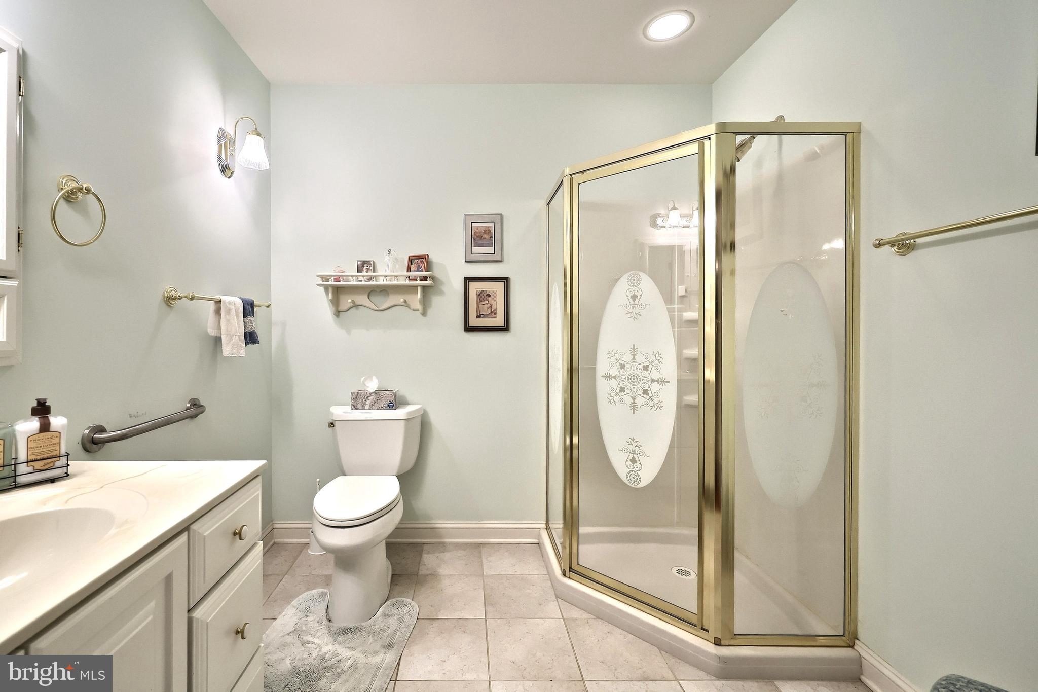2700 Stockton Road Phoenix, MD 21131 - Photo 39 of 84 a bathroom with a granite countertop sink toilet and shower