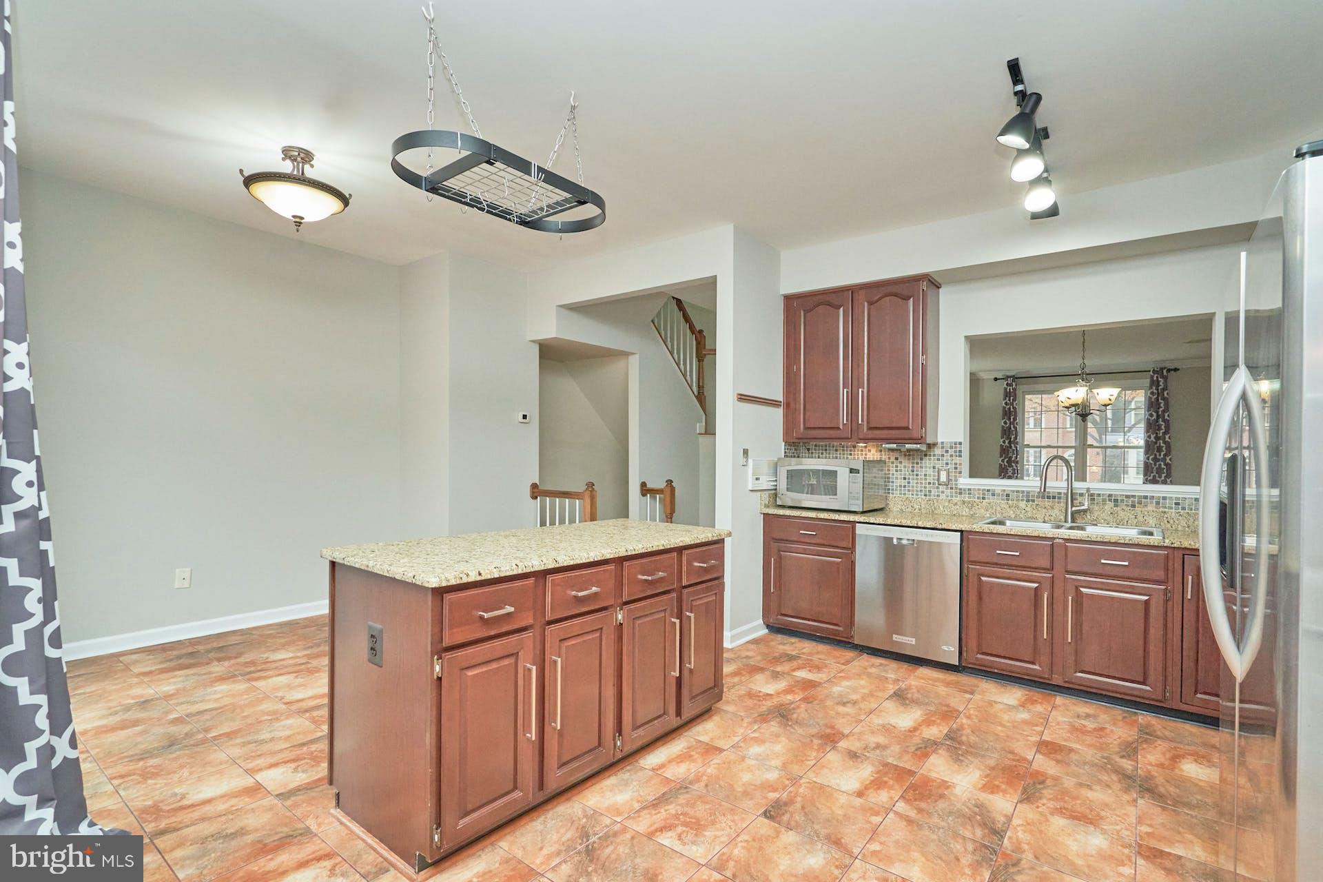 3647 Ransom Place Alexandria, VA 22306 - Photo 13 of 38 Kitchen Pass Through to Dining/Living Rms