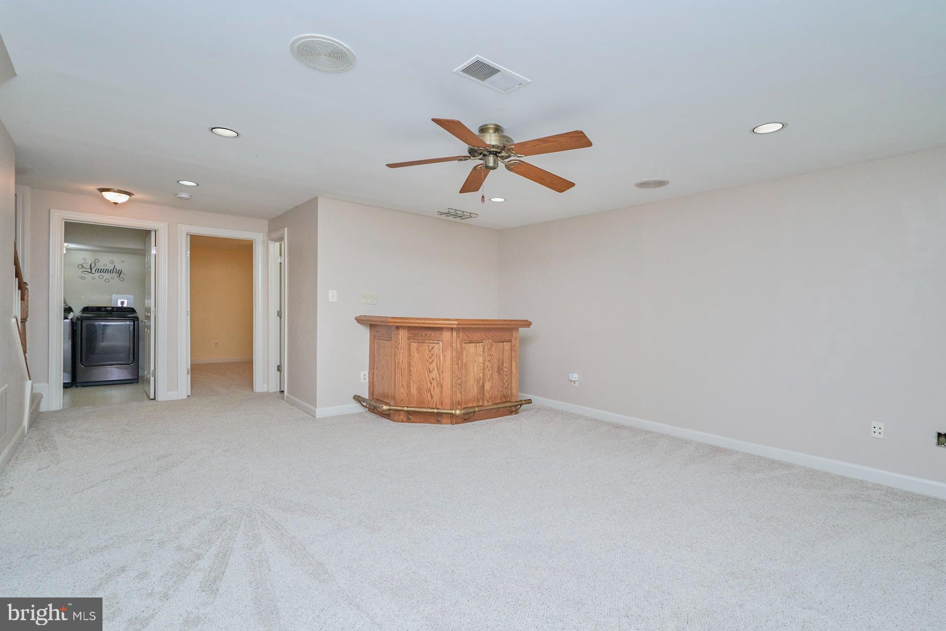 3647 Ransom Place Alexandria, VA 22306 - Photo 27 of 38 Recreation Room Wet Bar and Ceiling Fan