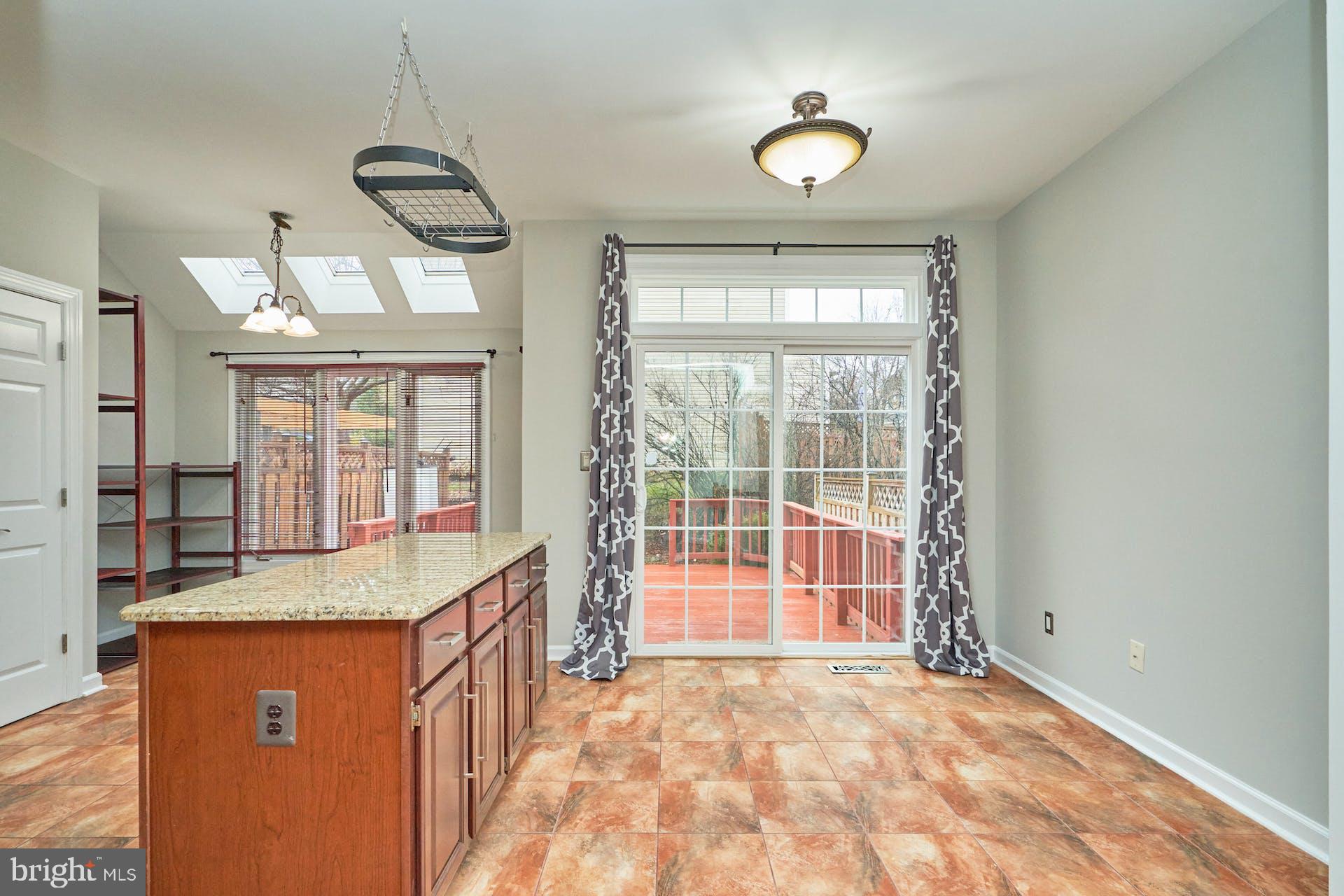 3647 Ransom Place Alexandria, VA 22306 - Photo 9 of 38 Sliding Door from Kitchen to Deck