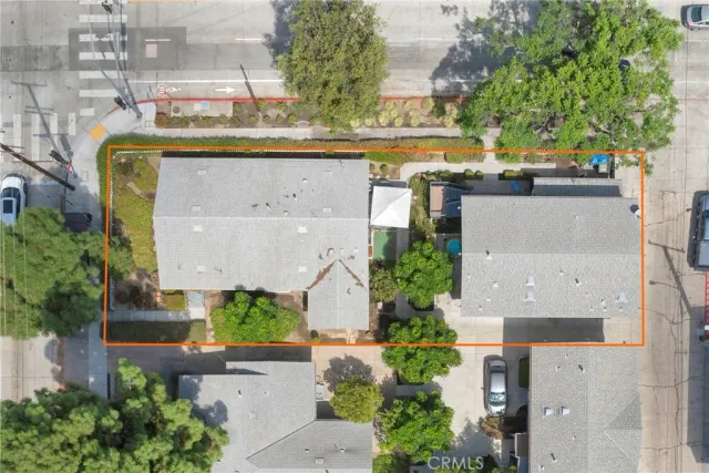 an aerial view of a building with outdoor space