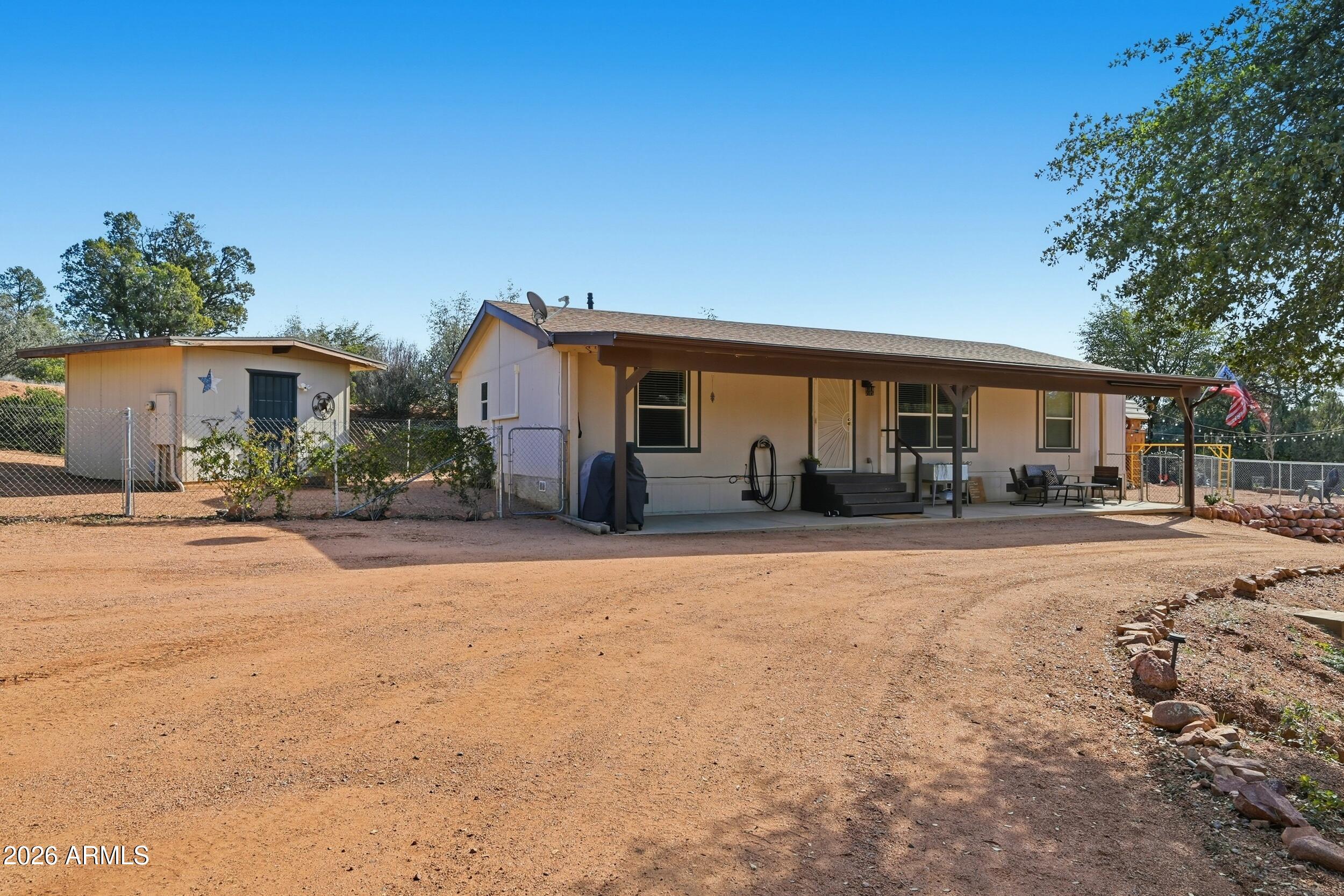 a view of a house with a patio