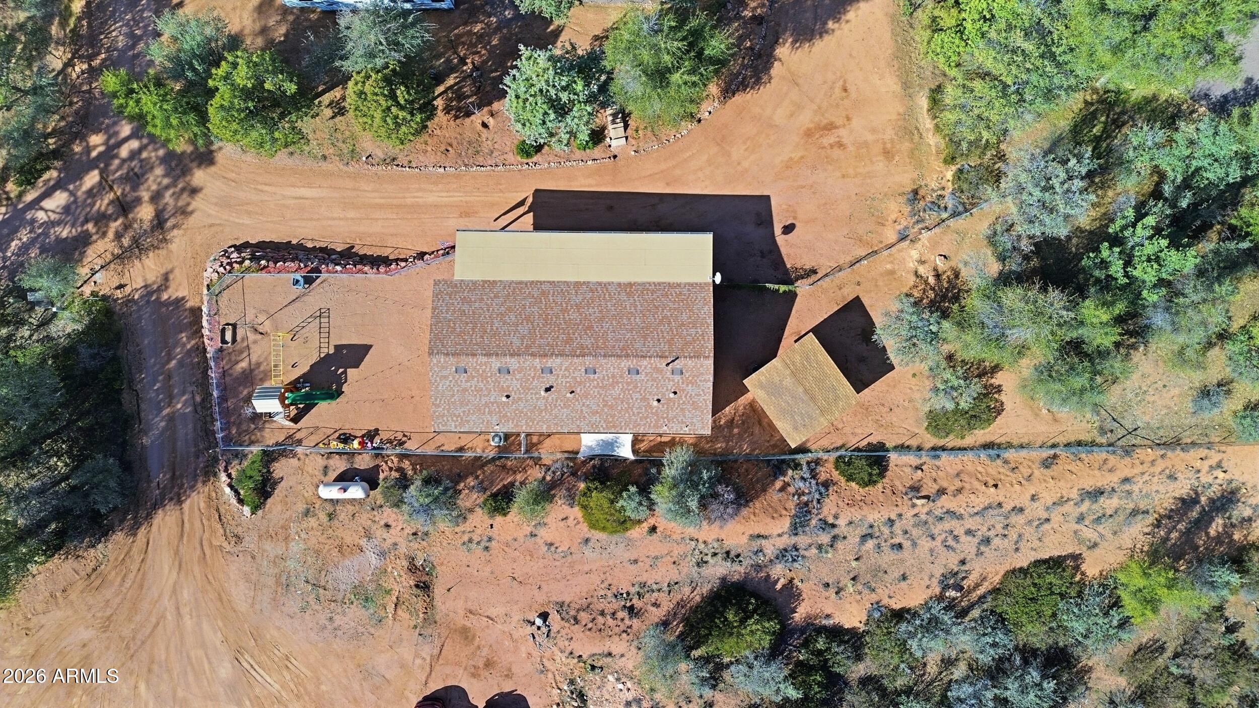 140 East Lariat Drive Payson, AZ 85541 - Photo 27 of 32 an aerial view of a house with a yard