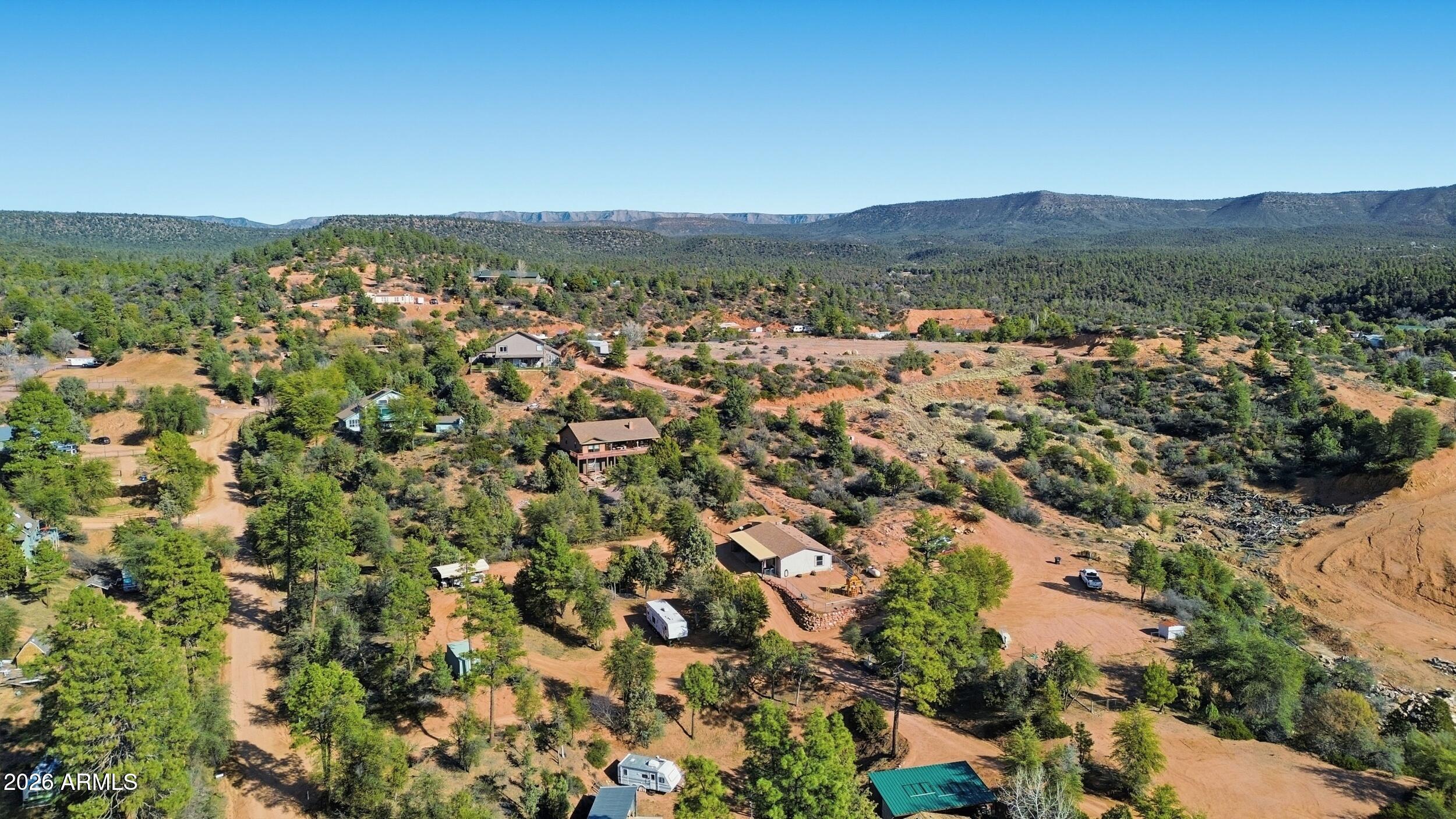 140 East Lariat Drive Payson, AZ 85541 - Photo 28 of 32 an aerial view of residential houses with outdoor space and trees