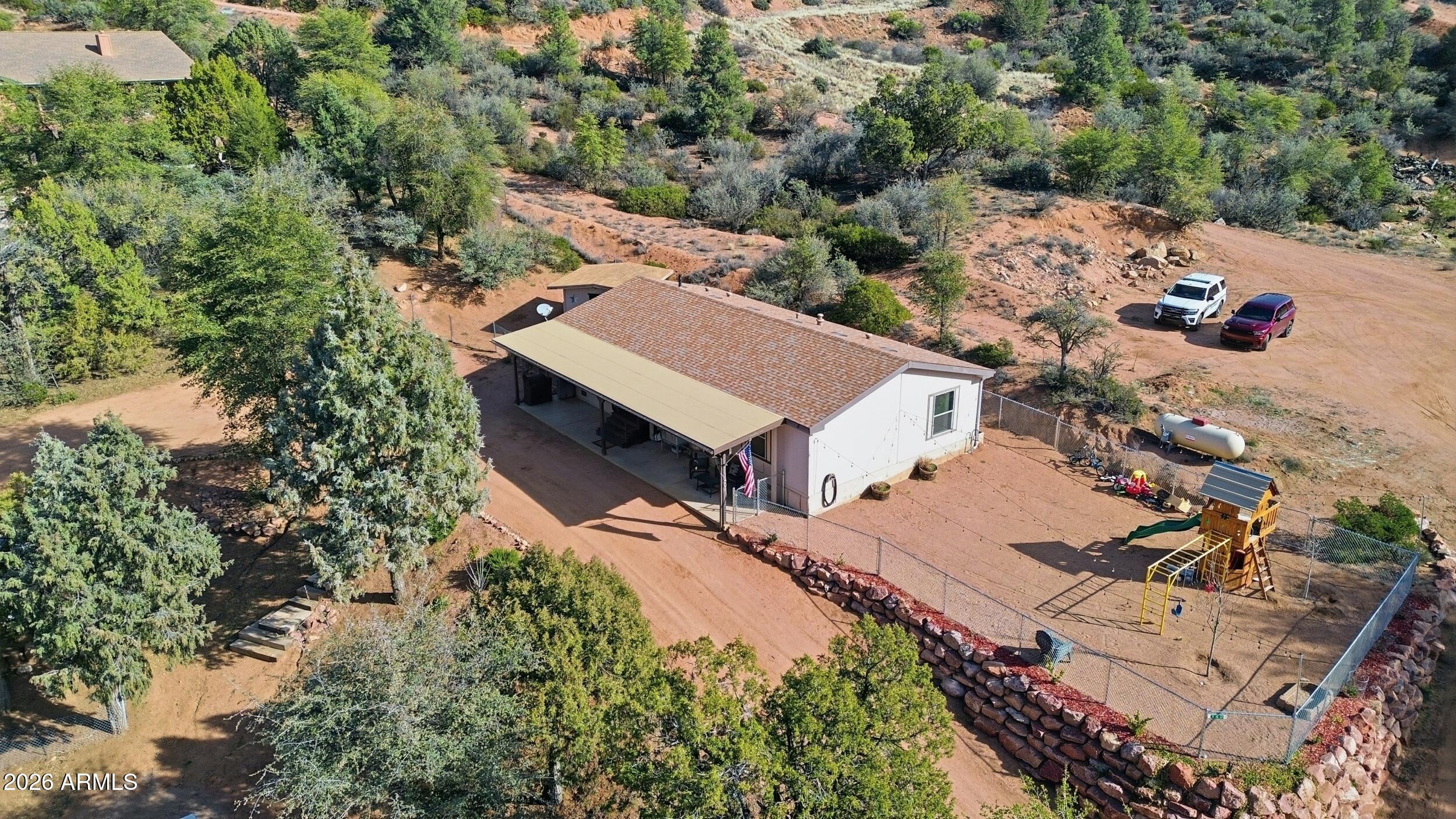 140 East Lariat Drive Payson, AZ 85541 - Photo 30 of 32 an aerial view of residential houses with outdoor space