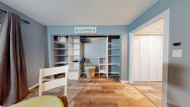 a view of living room with furniture and window
