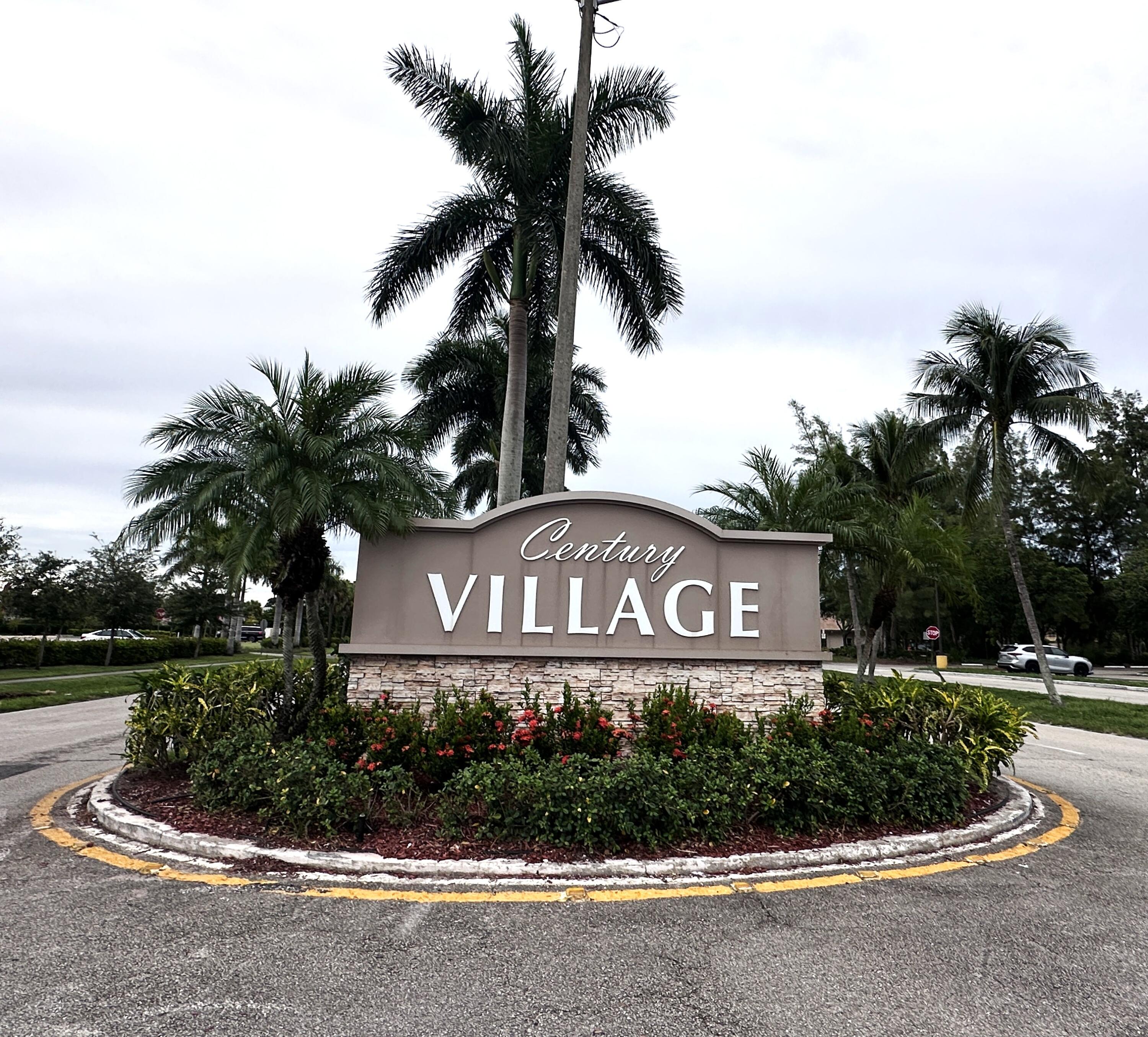130 Dorchester East, Unit F West Palm Beach, FL 33417 - Photo 2 of 28 a sign that is sitting on the side of the road