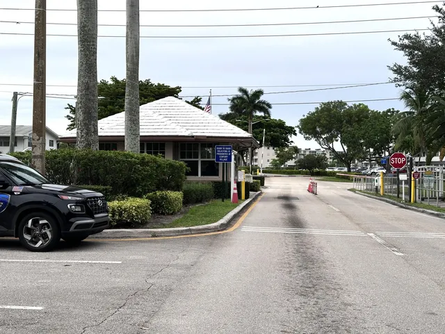 a view of a street with cars