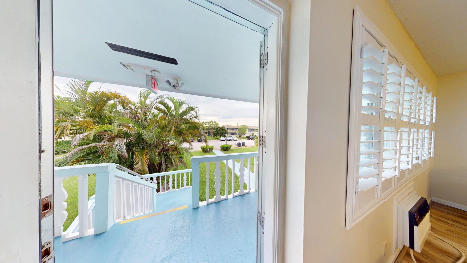 130 Dorchester East, Unit F West Palm Beach, FL 33417 - Photo 5 of 28 a view of a balcony