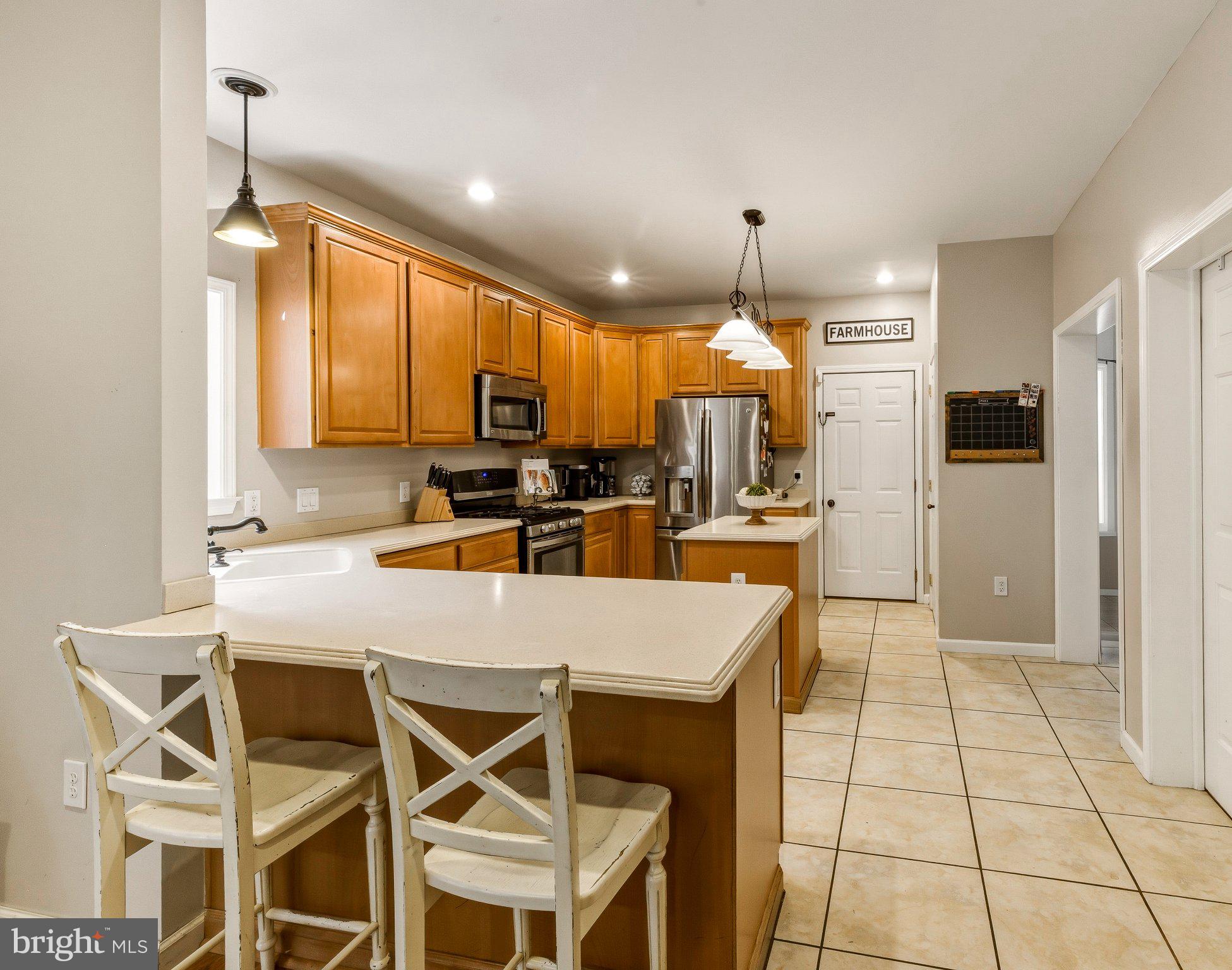 459 Alloway Aldine Road Elmer, NJ 08318 - Photo 22 of 65 Modern kitchen with warm wood tones.
