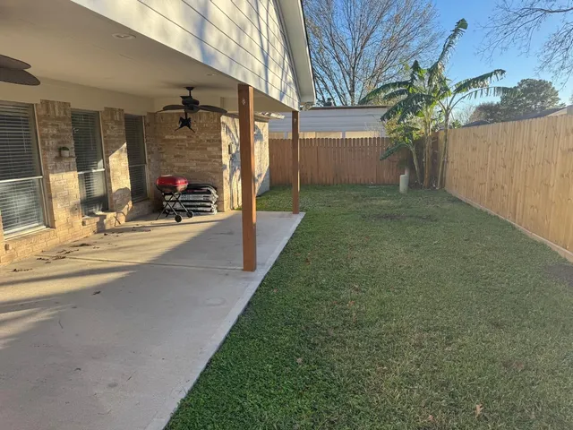 a view of a house with a patio