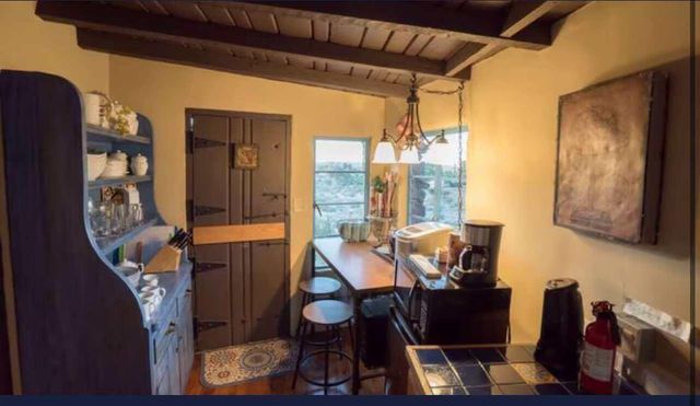 a kitchen with a stove and a sink