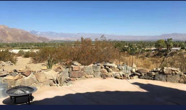a view of lake with mountain