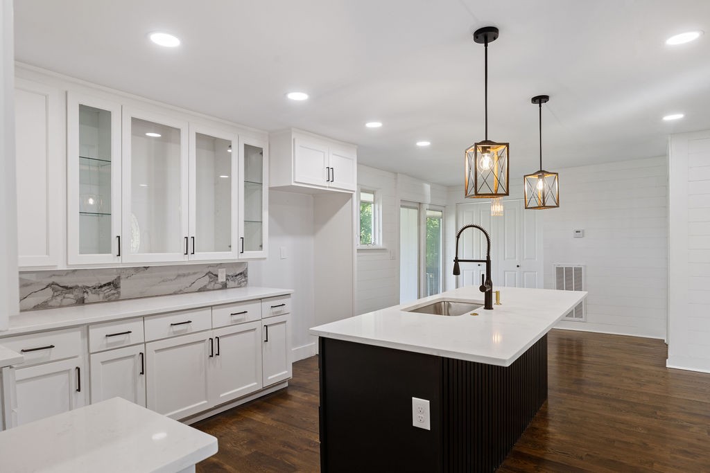 1124 Apple Street Lewisburg, TN 37091 - Photo 12 of 24 a kitchen with kitchen island a sink stainless steel appliances and cabinets