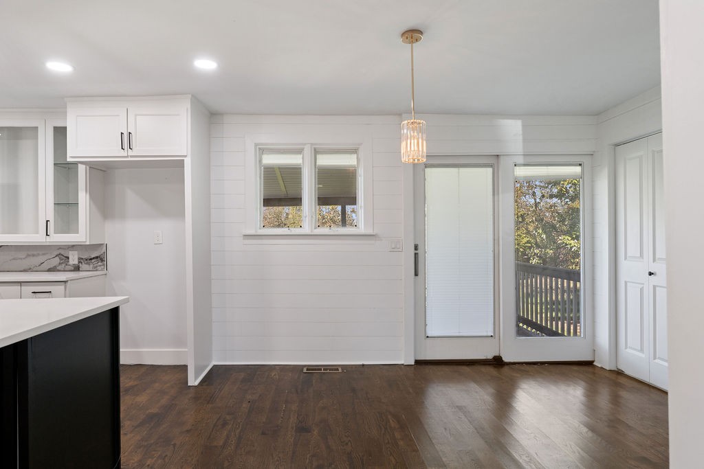 1124 Apple Street Lewisburg, TN 37091 - Photo 13 of 24 a view of an empty room with wooden floor and a window