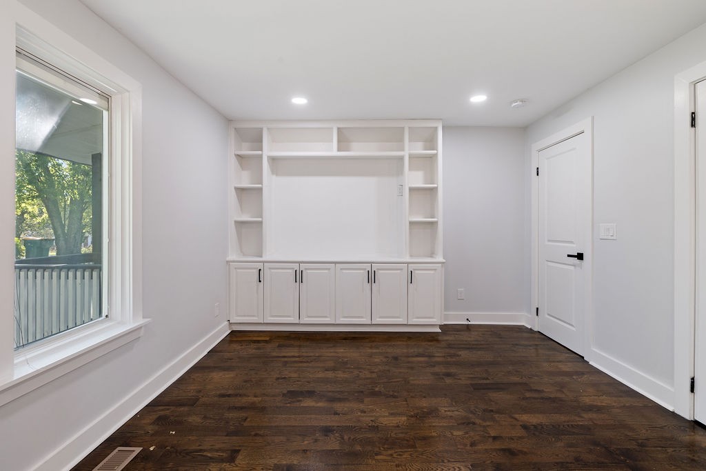 1124 Apple Street Lewisburg, TN 37091 - Photo 16 of 24 an empty room with wooden floor and windows