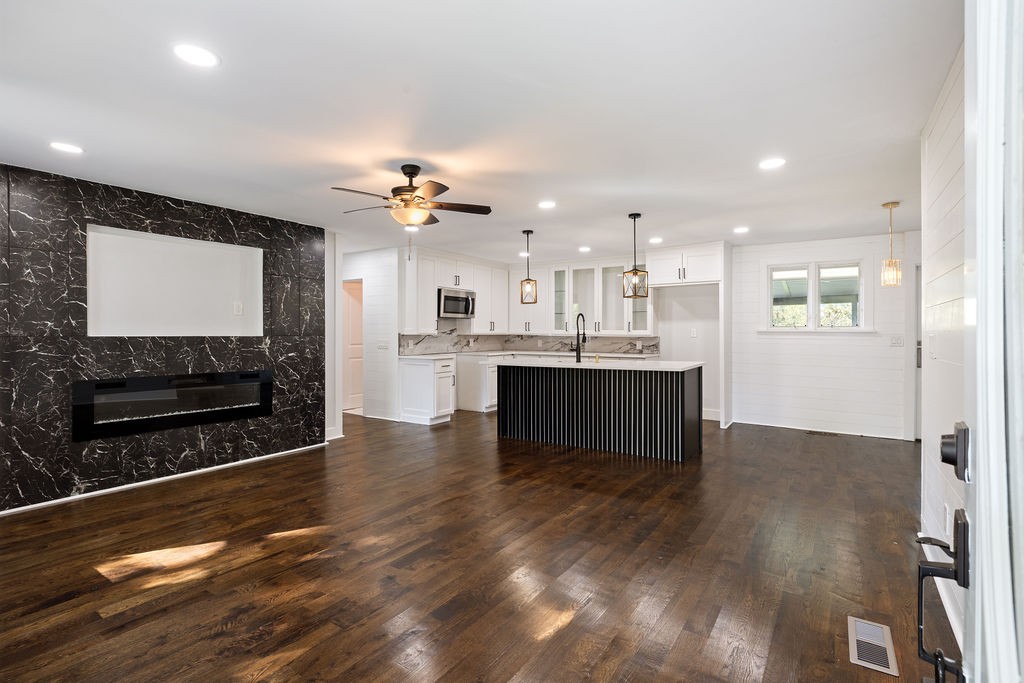 1124 Apple Street Lewisburg, TN 37091 - Photo 5 of 24 a view of kitchen with cabinets and wooden floor