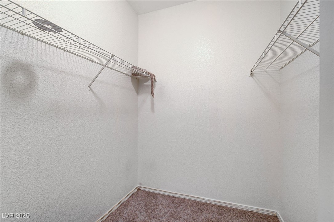 3318 North Decatur Boulevard, Unit 1061 Las Vegas, NV 89130 - Photo 21 of 49 Spacious closet featuring carpet floors