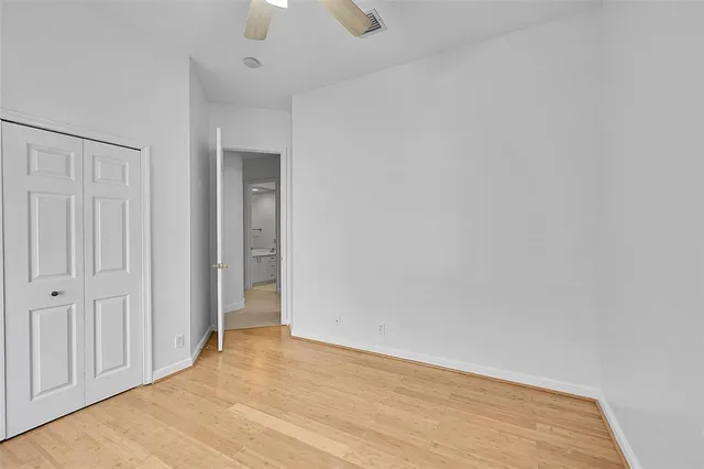 a view of a swimming pool with palm trees