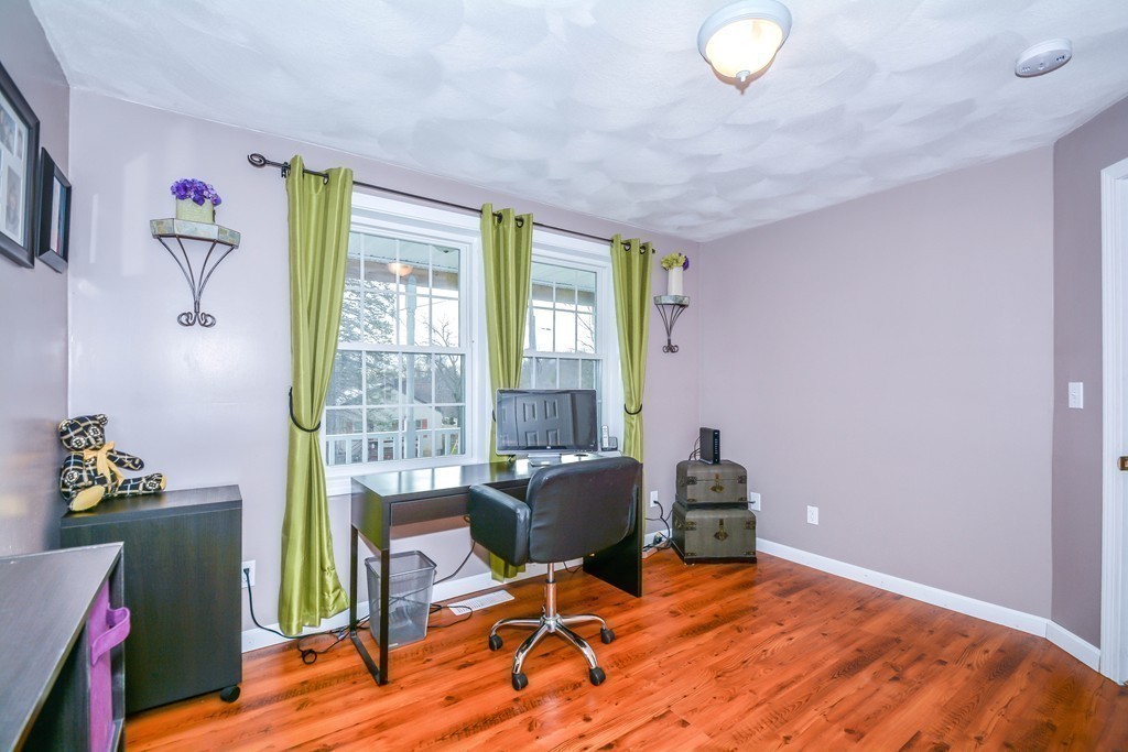 92 Concord Road Billerica, MA 01821 - Photo 15 of 25 a workspace with furniture and a window