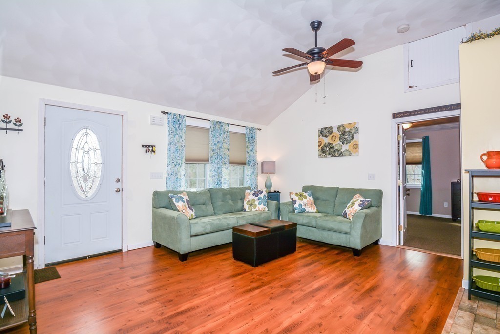 92 Concord Road Billerica, MA 01821 - Photo 3 of 25 a living room with furniture and a large window