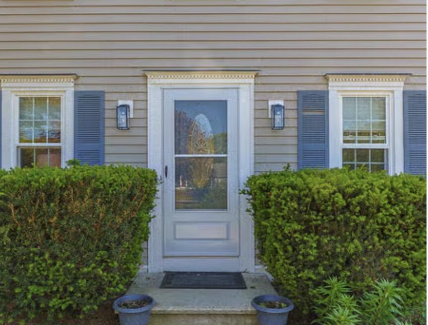 30 Sheffield Place Mashpee, MA 02649 - Photo 2 of 38 a front view of a house with garden