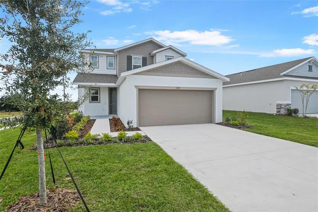 a front view of house with yard