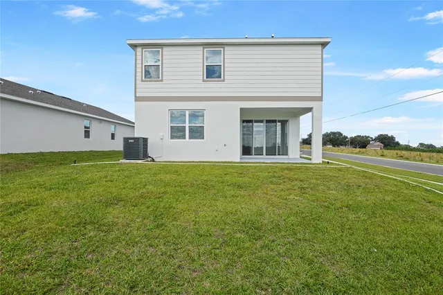 a view of a house with a garden