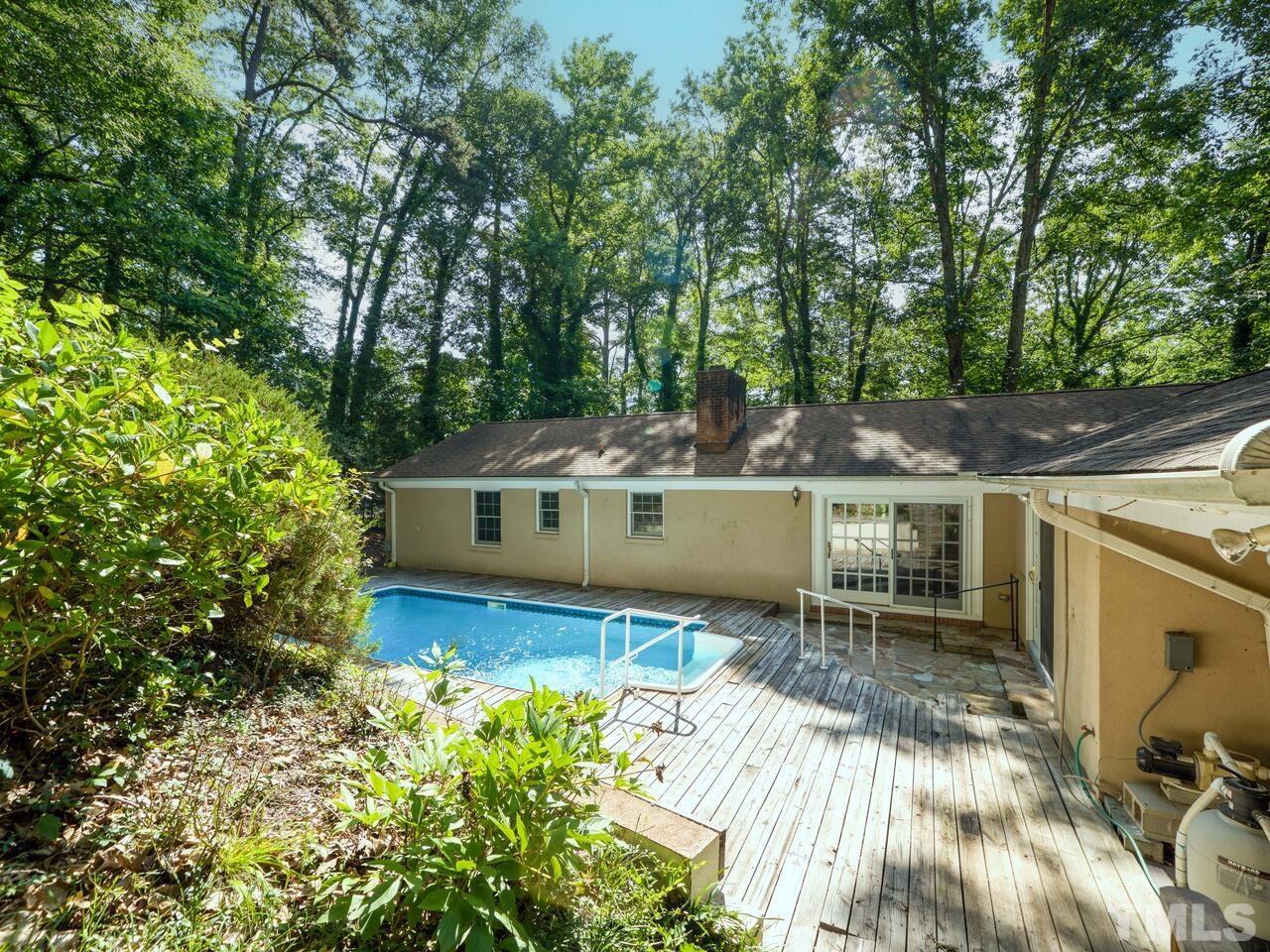 115 Old Oxford Road Chapel Hill, NC 27514 - Photo 1 of 54 front view of a house with a yard