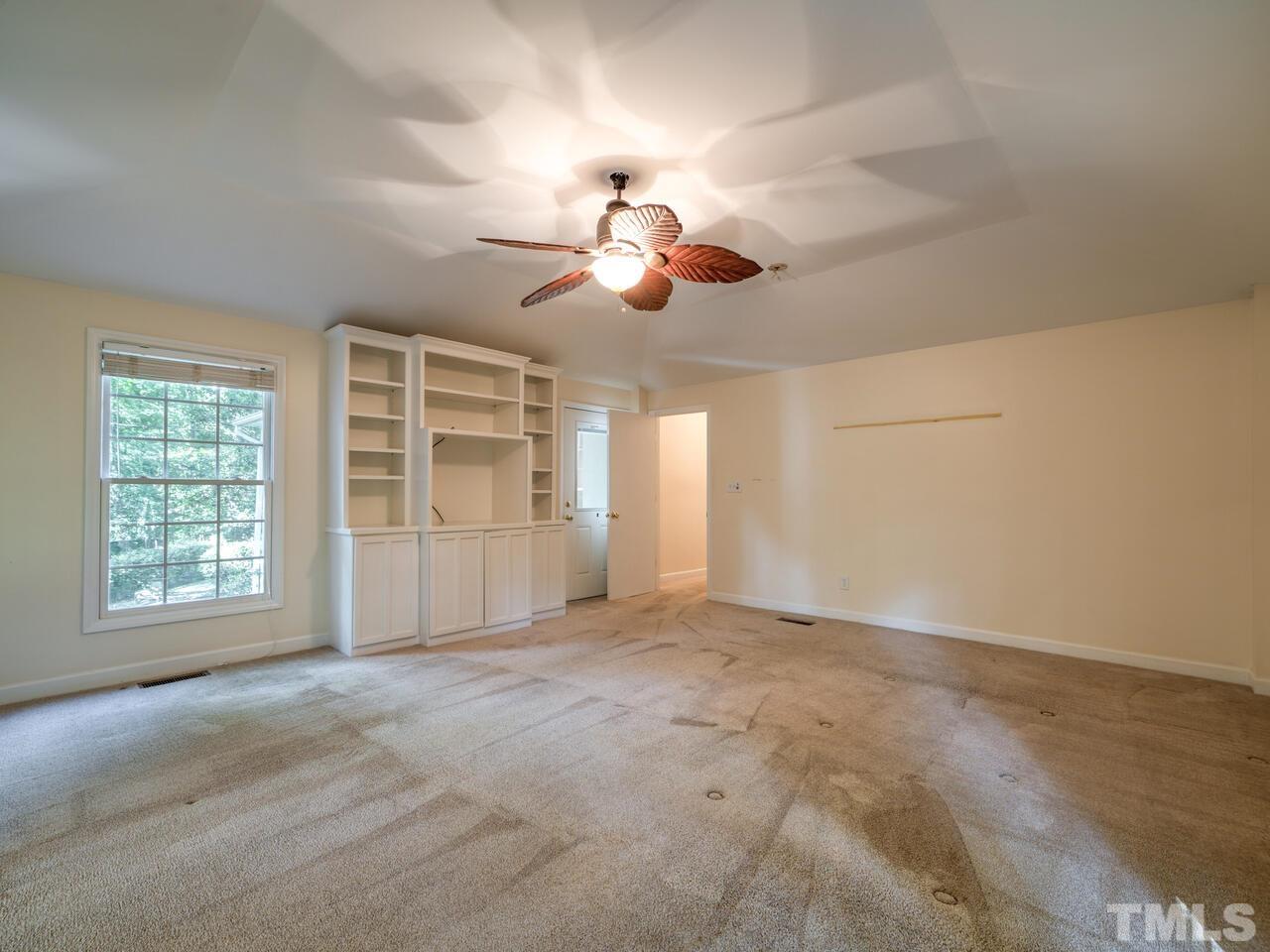 115 Old Oxford Road Chapel Hill, NC 27514 - Photo 25 of 54 a view of an empty room with a window