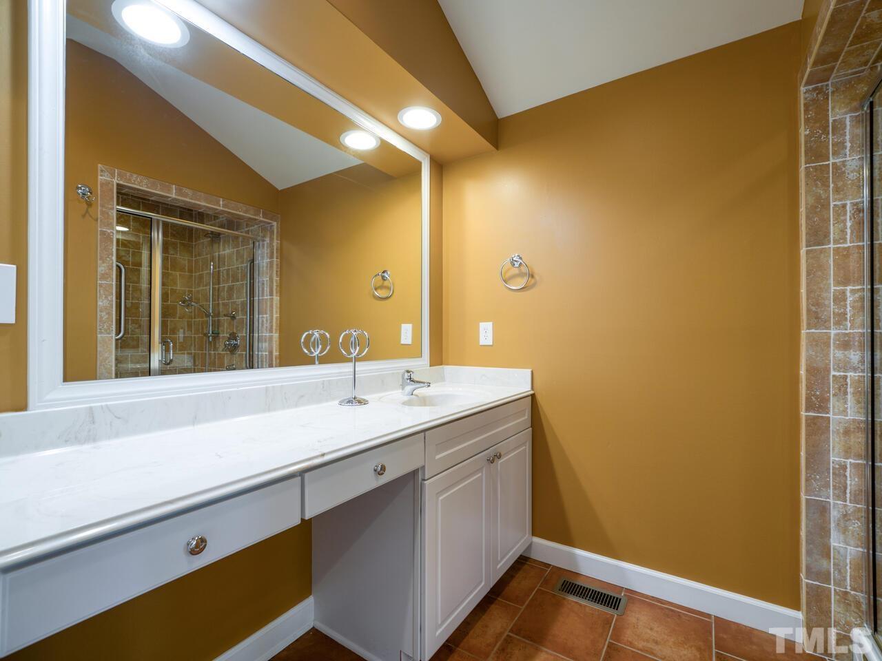 115 Old Oxford Road Chapel Hill, NC 27514 - Photo 30 of 54 a bathroom with a sink and a mirror