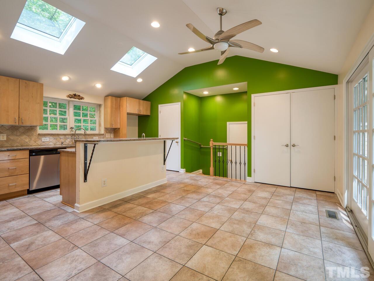 115 Old Oxford Road Chapel Hill, NC 27514 - Photo 3 of 54 a view of a kitchen with a sink and a window