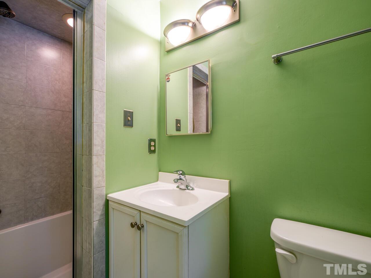 115 Old Oxford Road Chapel Hill, NC 27514 - Photo 33 of 54 a bathroom with a sink and a mirror