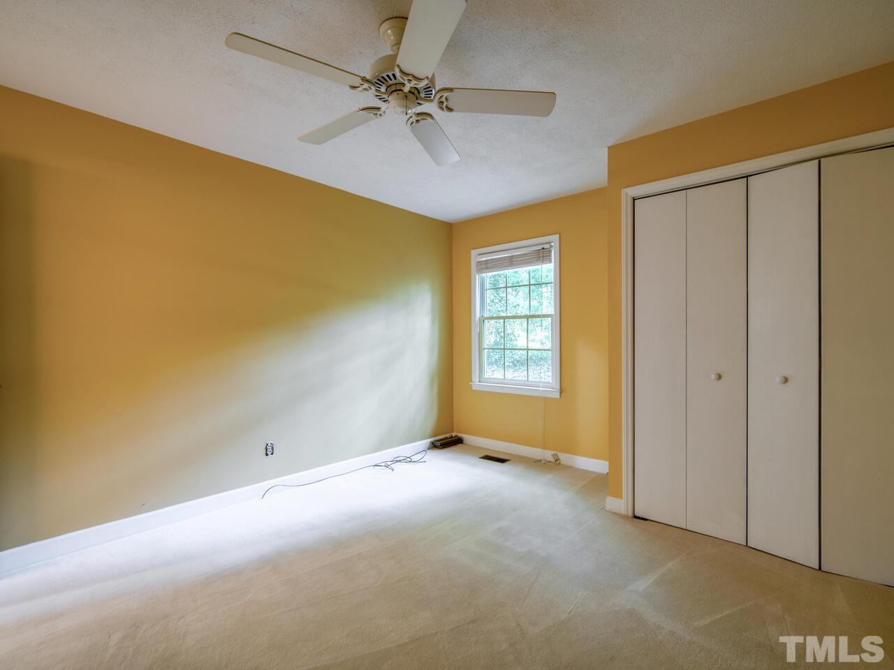 115 Old Oxford Road Chapel Hill, NC 27514 - Photo 35 of 54 wooden floor in an empty room with a window