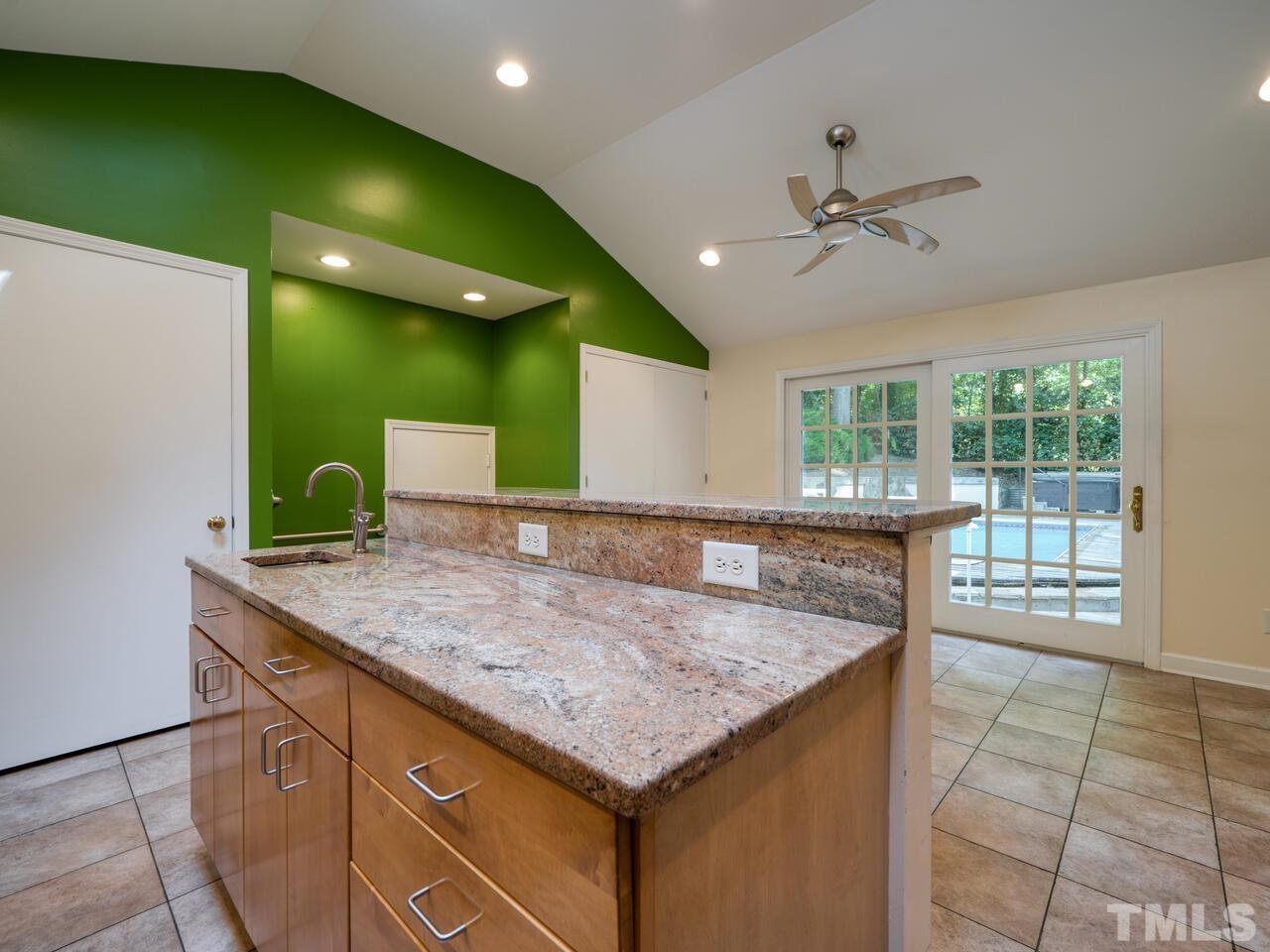 115 Old Oxford Road Chapel Hill, NC 27514 - Photo 4 of 54 a kitchen with a sink a counter top space and appliances