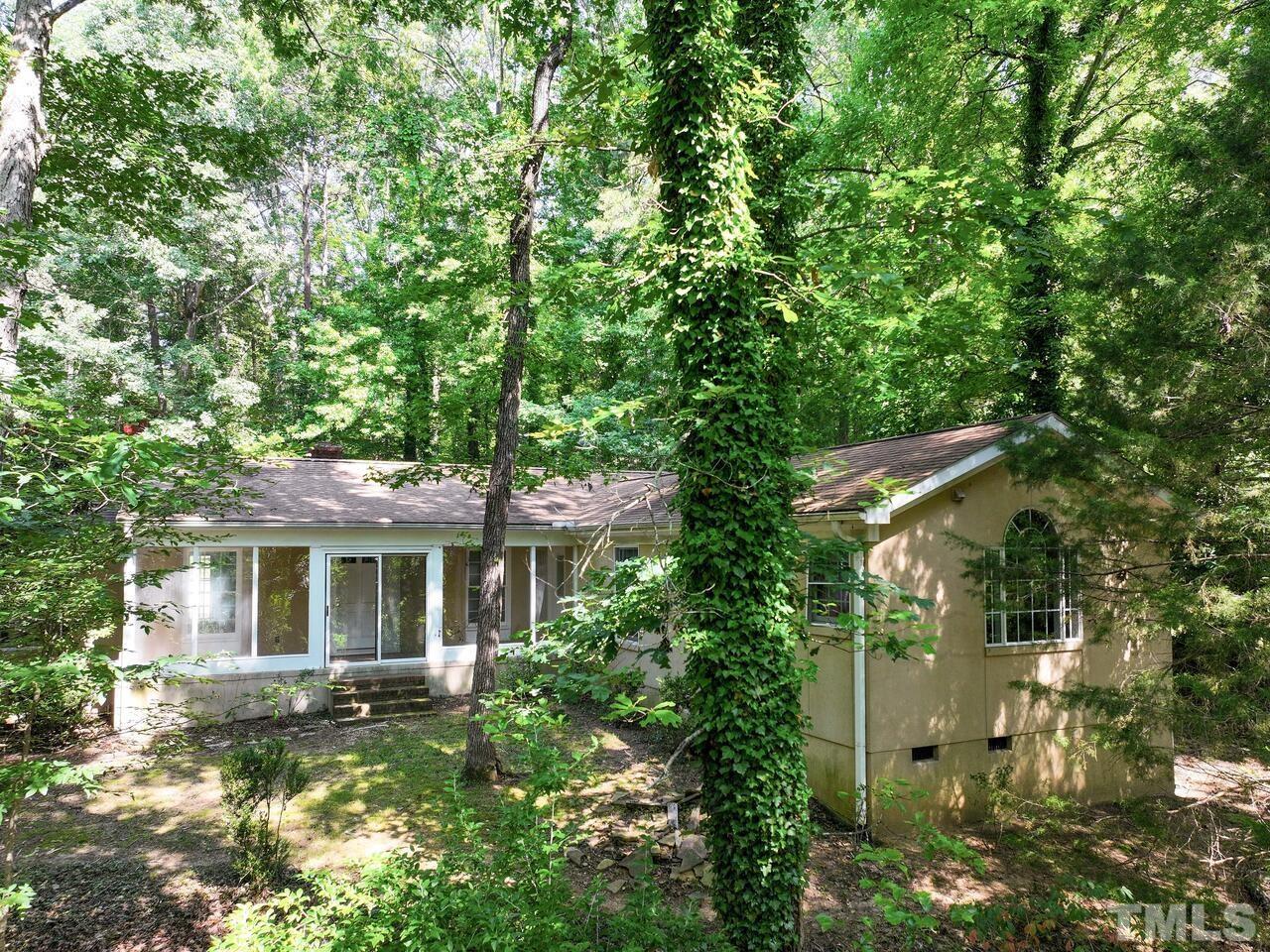 115 Old Oxford Road Chapel Hill, NC 27514 - Photo 51 of 54 front view of house with a yard