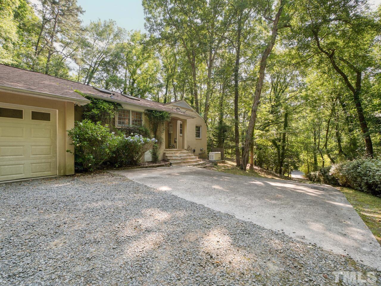 115 Old Oxford Road Chapel Hill, NC 27514 - Photo 52 of 54 a view of a house with a backyard and tree
